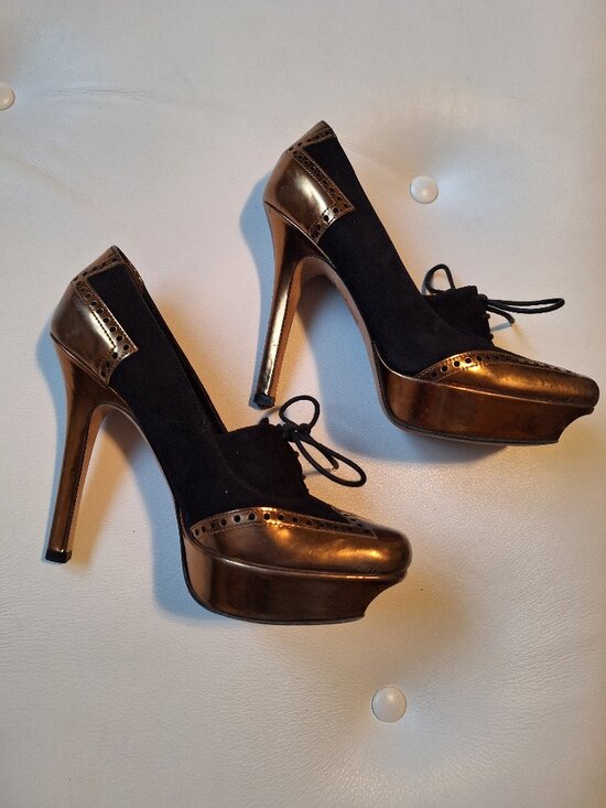 Gucci Shoes - Gucci black and gold platform stiletto heels